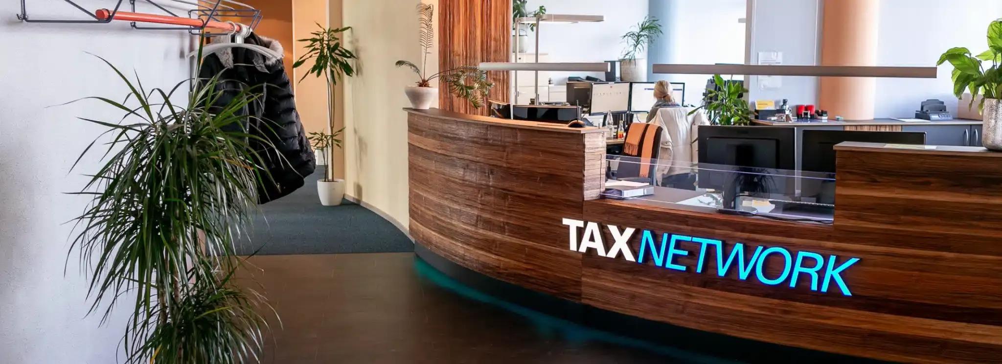 zu sehen ist die Tax Network Rezeption 
